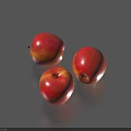 Three Fresh Red Apples With Shiny Surface Placed On Gray Background