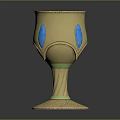 Elegant Golden Decorative Cup With Blue Accents And Intricate Patterned Base