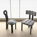 Stylish Dining Chairs With Unique Backrest Designs Floral Patterned Seats And Black Legs 3d model