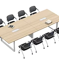Light Wood Rectangular Conference Table with Black Chairs Around and Notebooks with Pens on Top