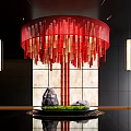 Red Chandelier Interior Landscape With Circular Block Design Black Tray Green Grass And Stones
