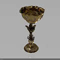 Golden Decorative Goblet with Intricate Floral Patterns on Tall Stem and Ornate Base