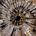 Modern Luxury Chandelier With Cascading Metal Strips And Warm Illumination Design