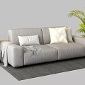 Gray Two Seater Sofa With Pillows Throw Blanket Side Table Lamp And Plant On Rug