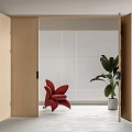 Wooden Folding Doors Open In Modern Interior With Red Chair And Green Plant