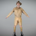 Man Standing In Brown Expedition Outfit With Hat Shorts Knee High Socks And Arms Outstretched