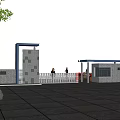 Modern Entrance Gate With Stone Pillars Metal Fence Guardhouse Parking Lot Surface And Blue Sky