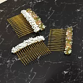 Elegant Hair Combs With Golden Teeth Pearl And Colored Gemstone Decor On Marble Background
