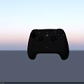 Black Wireless Game Controller With Ergonomic Design And Dual Joysticks