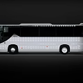 Modern White City Bus With Bright Headlights And Sleek Exterior Design