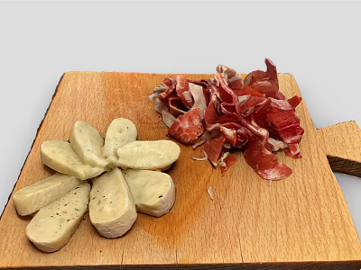 Petal Shaped Cheese Slices And Sliced Ham On Wooden Cutting Board 3d model
