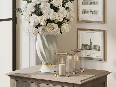 Light White Vase With White Flowers On Wooden Cabinet With Glass Candle Holders And Paintings 3d model