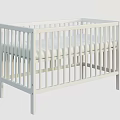 White Baby Crib With Simple Design Safety Rails And Comfortable Mattress