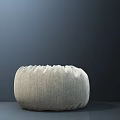 Light Gray Round Decorative Cushion With Pleated Textured Surface Against Dark Background 3d model