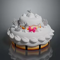 Two Layer White Frosting Cake With Pink Bow And Decorative Striped Golden Base