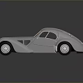 Silver Vintage Classic Car With Streamlined Body And Retro Headlights