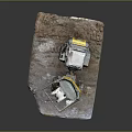 Utility Vehicle With Yellow Bucket Gray Cabin On Muddy Construction Work Site