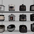 Neatly Arranged Kitchen Appliances Including Rice Cookers And Pressure Cookers On White Shelves