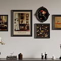 Elegant Wall Arrangement With Various Framed Artworks And Tabletop Decorative Items 3d model