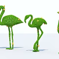 Three Flamingo Shaped Topiary Shrubs With Yellow Flowers In Different Poses