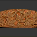 Orange Intricately Carved Decorative Ornament Set With Floral And Leaf Patterns