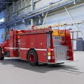Red Fire Truck Parked In Large Industrial Warehouse With Metal Structure Roof And Ceiling Lights