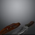 Hunting Knife With Red Decorative Sheath Brown Handle And Metallic Blade