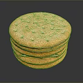 Stack of Golden Crackers with Small Holes on Surface on Dark Background