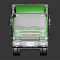 Green Heavy Duty Dump Truck With Open Cargo Bed And Multiple Wheels