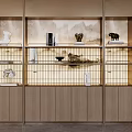 Elegant Modern Decorative Cabinet With Wooden Shelves Displaying Ornaments Books And Sculptures