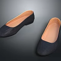 Pair of Women's Black Flat Shoes With Textured Upper And Light Brown Insole