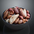 Bowl of Assorted Mixed Nuts with Various Colors Shapes and Sizes