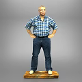 Man Standing With Hands On Hips In Plaid Shirt Against Gray Background On Wooden Base