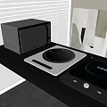 Sleek Modern Kitchen Countertop With Microwave Oven And Induction Cooktops Appliances