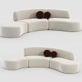 Modern Beige Curved Sectional Sofa With Two Brown Round Decorative Cushions 3d model