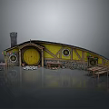 Hobbit Cottage with Yellow Exterior Round Door Stone Walls Chimney and Decorative Flags Tables Benches