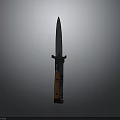 Long Slender Blade Knife With Wooden And Black Handle Standing Upright On Grey Background