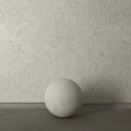 Beige Sphere Decorative Component With Textured Beige Wall And Gray Floor