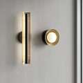 Modern Rectangular And Circular Wall Sconces With Black Gold Finishes Soft Illumination On Gray Wall 3d model