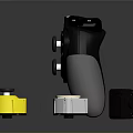 Black Game Controller With Display And Small Accessories Including Yellow White Components