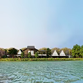 Lakefront Camping Site with Triangle Shaped Tents Surrounded by Trees and Green Grass
