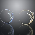 Stylish Circular Decorative Rings With Branch Flower Design Blue And Gold Finish On Reflective Surface