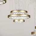 Modern Chandeliers With Gold Circular Frames And Crystal Decorations In Indoor Setting 3d model