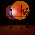 Modern Floor Lamp With Circular Light Projection And Potted Plant In Indoor Space