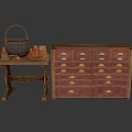 Vintage Wooden Table With Metal Pot And Bottles Alongside Red Multi Drawer Cabinet
