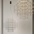 Modern Elegant Chandeliers With Metal Frame And Illuminated Light Bulbs In Interior