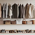 Stylish Hanging Clothes With Various Bags And Shoes In Organized Wardrobe