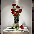 Decorative Ornament Combination with Red Roses in Transparent Vase on Marble Tabletop
