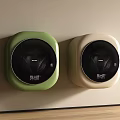 Two Modern Wall Mounted Washing Machines With Square Design Green And Cream Colors