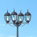 Outdoor Lamp Post With Four Lantern Heads Traditional Black Design For Garden Decor